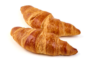 Two buttery croissants isolated on white background.