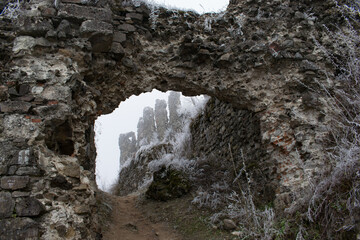 Ruins of the castle in Carpatians in winter
