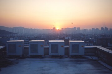 Korean Urban Rooftop at Sunset with Industrial Silhouettes and Cityscape