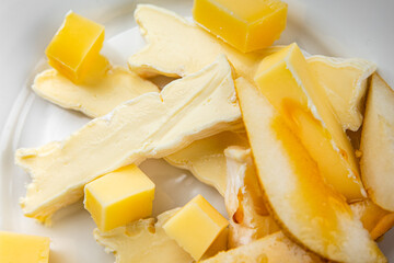 Cheese plate French cheeses fresh tasty food dish delicious gourmet food background on the table rustic food top view copy space