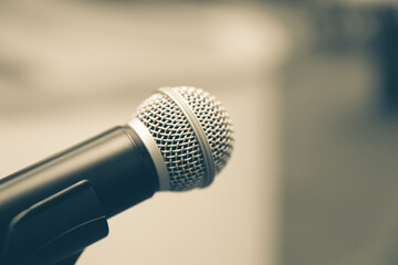 Fototapeta premium Microphone for press conference speaker report interview concepts or broadcasting public speaking speech presentation stage performance and reporter news with empty copy space background.