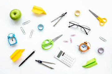 Creative flat lay with school supplies and stationery, top view