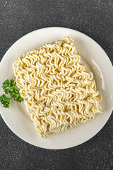 instant noodles raw fast food fresh tasty food dish delicious gourmet food background on the table rustic food top view copy space