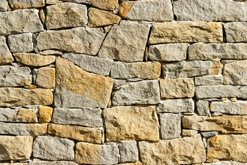 Stone facade pattern. Facade, stones, irregular bricks. Pattern, shape.