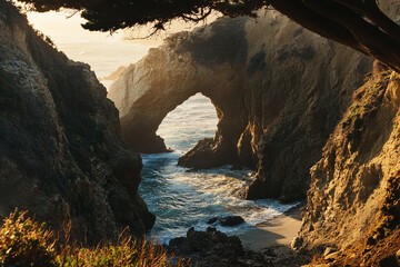 Sunlit coastal arch with rugged cliffs and gentle ocean waves at a serene beach setting