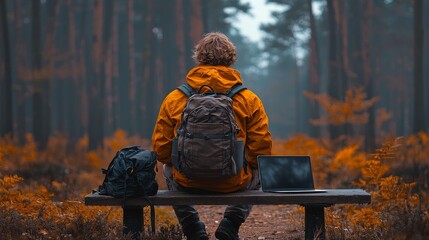 Fototapeta premium A person works remotely while surrounded by nature, pairing their productivity with the serenity of the outdoors using their laptop