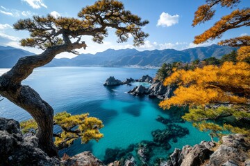 Naklejka premium A breathtaking coastal view of Izu Peninsula, with turquoise waters crashing against rugged cliffs and pine trees lining the shore