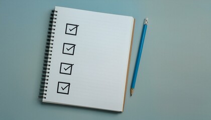 A blank notebook with a checklist being filled in and the last box being checked