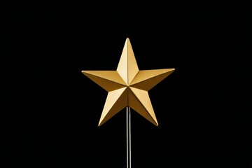 there is a gold star on a black background