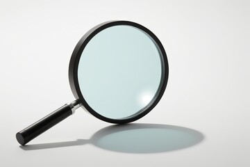 a close up of a magnifying glass on a white surface