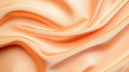 Fototapeta premium Velvet abstract background idea. Elegant silk fabric texture with soft waves in warm peach tones, perfect for backgrounds.