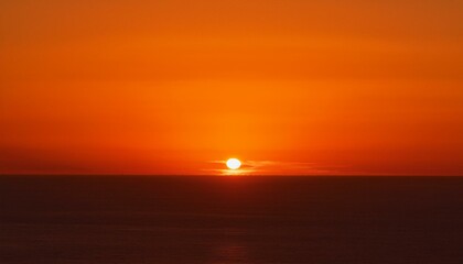 Fototapeta premium The point at which the temperature gradually drops in a bright orange sunset