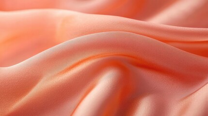 Fototapeta premium Velvet abstract background idea. Soft peach satin fabric with gentle waves and subtle sheen for elegant designs.