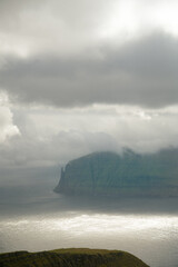 Dramatic clouds over the mountains of the Faroe Island 