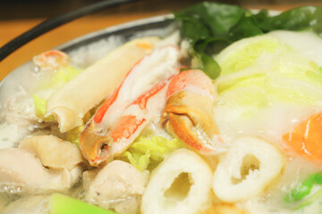 Japanese nabe, a classic winter dish of stewed crab, chicken, Chinese cabbage, fish meat, etc.