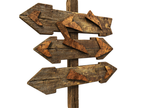 A rustic wooden signpost displaying multiple arrows pointing in different directions.