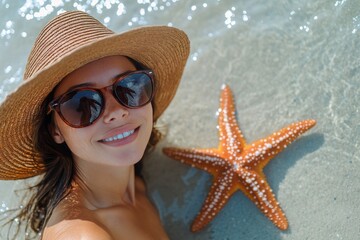 Enjoying a sunny day at the beach with a starfish in shallow water