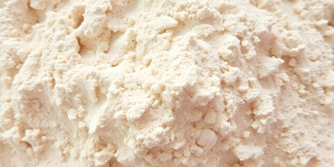 Fine white powder, scattered granular texture, flour-like substance, close-up macro photography, off-white color, dusty surface, baking ingredient, soft focus, high-contrast lighting, powdery consiste