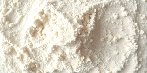 Fine white powder, scattered granular texture, flour-like substance, close-up macro photography, off-white color, dusty surface, baking ingredient, soft focus, high-contrast lighting, powdery consiste