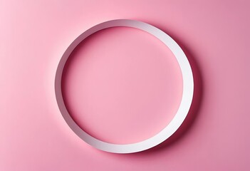 A pink background with a curved paper circle in the center