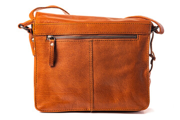 Zipper on a stylish brown leather bag.