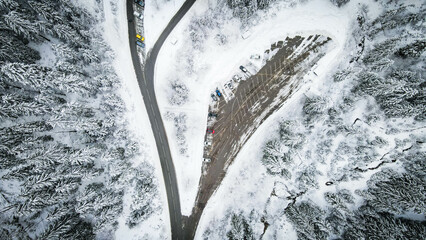 Aerial dron view at lake and mointains in winter time, Woods with snow