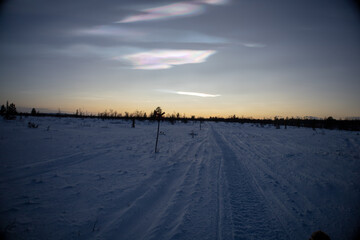 Polar stratospheric cloud, also known as nacreous clouds from nacre, or mother of pearl, due to its...