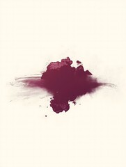 Rich burgundy ink drop dispersing in delicate, feather-like patterns, isolated on white