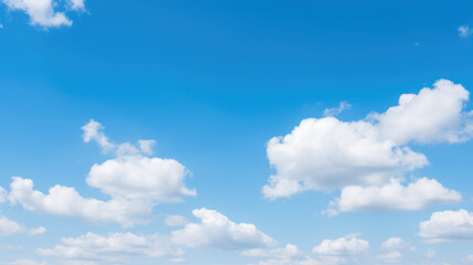 Fototapeta premium Serene Blue Sky With Fluffy Clouds