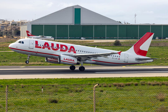 Luqa, Malta - January 2, 2025: Lauda Europe Airbus A320-232 (REG: 9H-LMG) lifting off from runway 13.