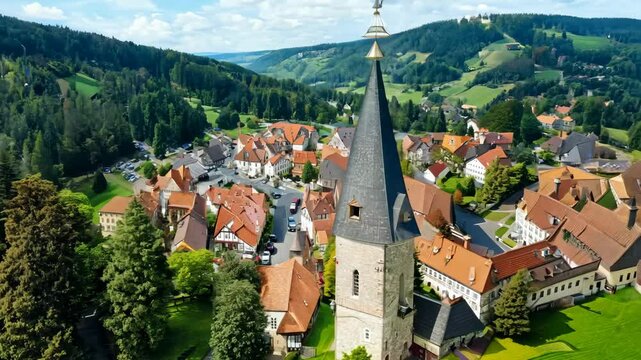 Aerial Adventure Over Charming Oberhof Village: Discover Traditional Structures and Vibrant Thuringia Countryside
