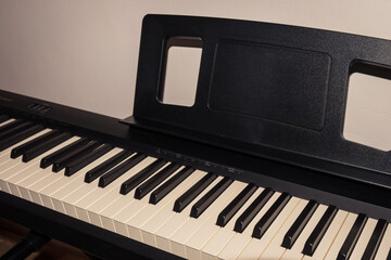 A digital piano keyboard close-up