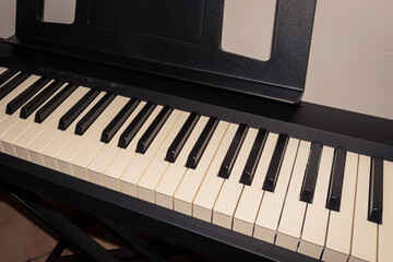 A digital piano keyboard close-up