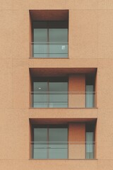 Fototapeta premium Modern Apartment Building Facade with Balconies
