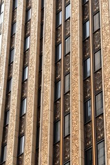 Ornate Facade of a Skyscraper with Golden and Bronze Details