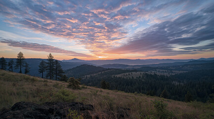 Serene Sunset Over Expansive Mountain Landscape