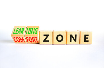 Comfort or learning zone symbol. Concept words Comfort zone Learning zone on wooden cubes. Beautiful white table white background. Business and comfort or learning zone concept. Copy space.