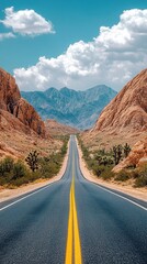 Fototapeta premium A panoramic shot of a long, empty highway stretching into the desert horizon under a dramatic sky with towering cumulonimbus clouds.