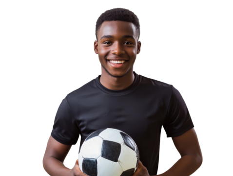 Young athlete holds soccer ball with a smile