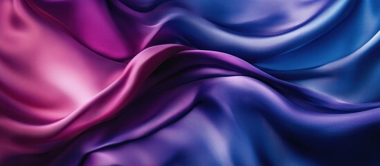 Fototapeta premium Abstract purple and blue silk fabric waves.