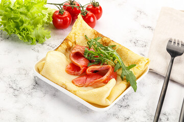 Russian pancake with salmon fish