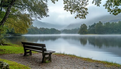 Obraz premium peaceful lakeside view with misty, calm waters and a serene, enchanting atmosphere, perfect for relaxation and reflection