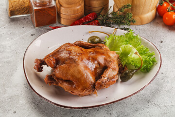 Baked small chicken with spices
