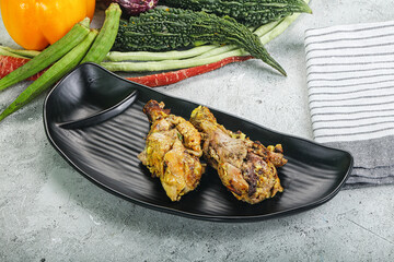 Chicken leg tikka with spices