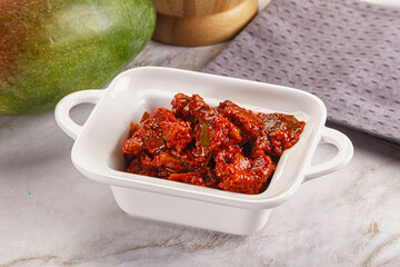 Spicy pickled raw green mango