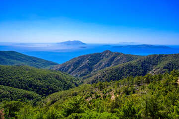 Monolithos Castle in paradise landscape scenery - travel destination on beautiful island Rhodes, Greece