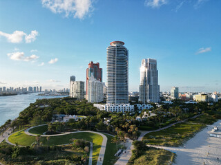 Fototapeta premium Aerial Miami south beach at sunny day. Marina landscape in South Beach, USA. Skyline panorama. Sea beach. Miami South beach landscape aerial view. Skyline aerial on Miami marina, Florida