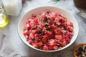 A bowl with Vinegret salad, a typical Russian dish