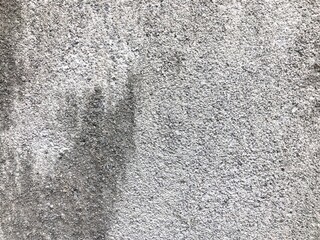 Empty gray and black concrete plaster wall texture, Cement plaster fence wall background