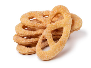 Heap of traditional Dutch cookies, Krakelingen, close up isolated on white background
